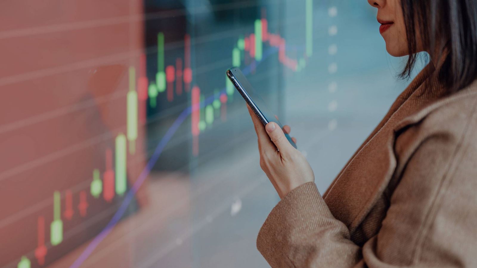 Woman looks at her smart phone